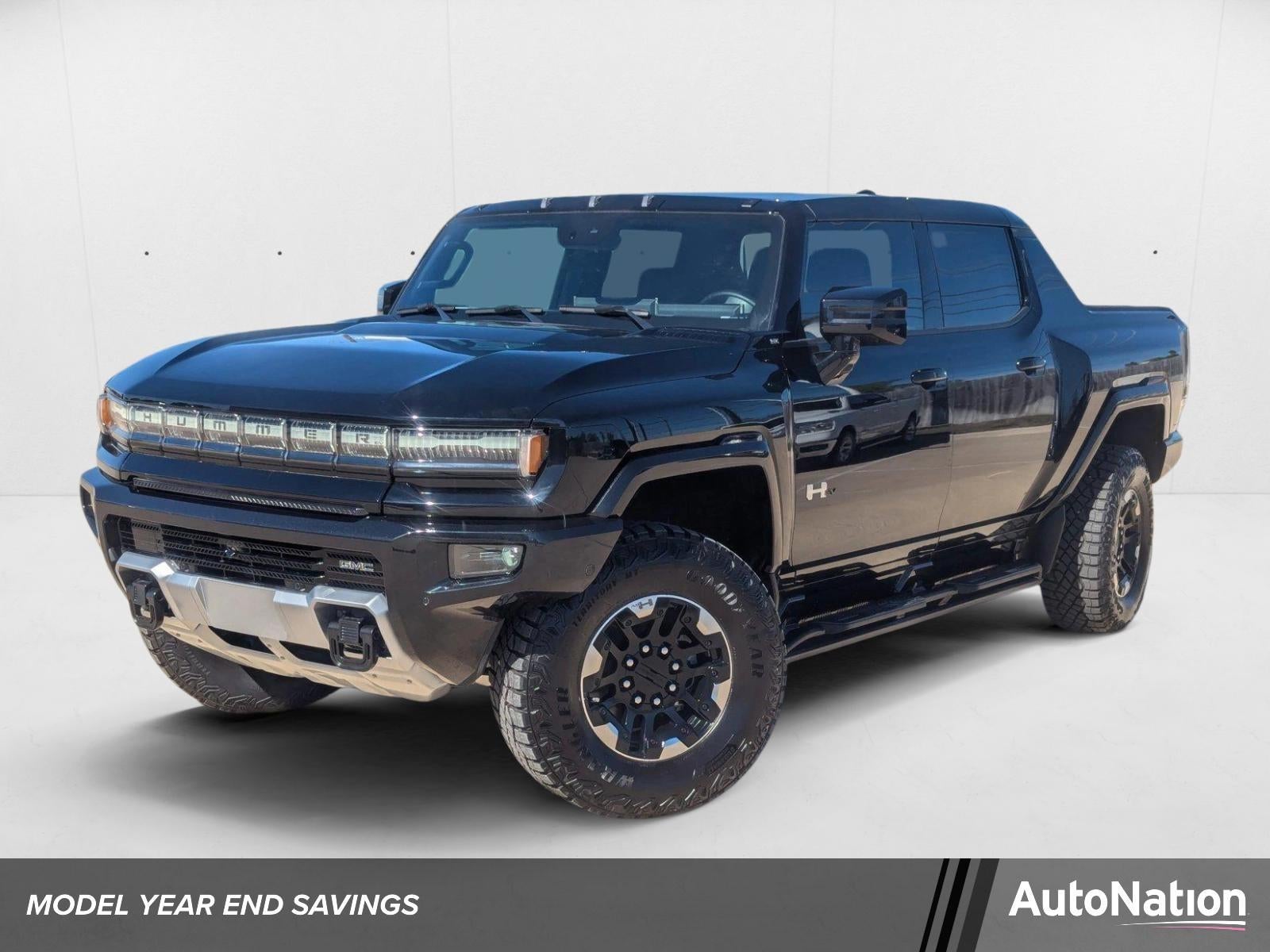 2025 GMC HUMMER EV Pickup 3X in Void Black — front three-quarter view