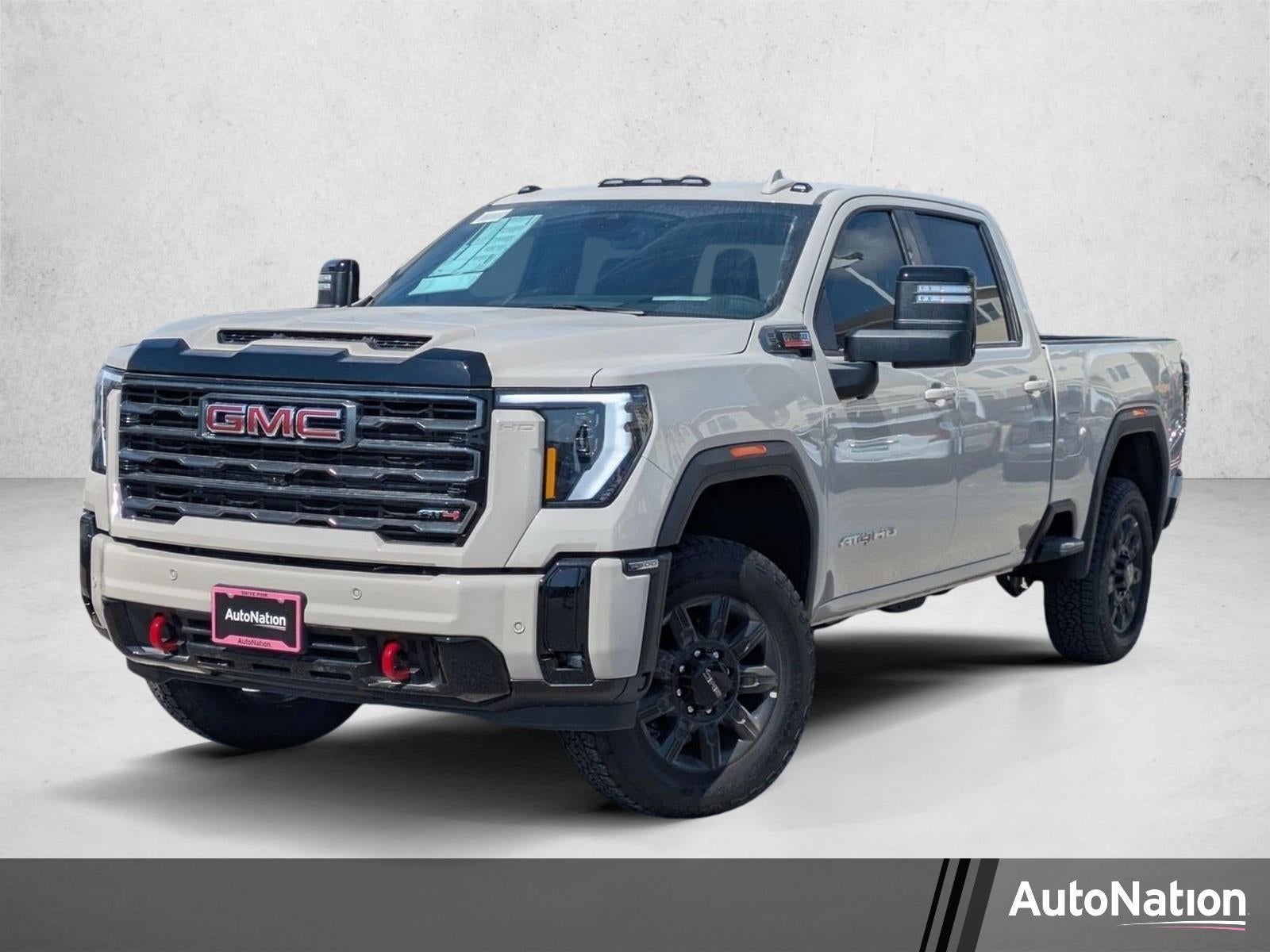 2026 GMC Sierra 2500 HD AT4 in Coastal Dune — front three-quarter view