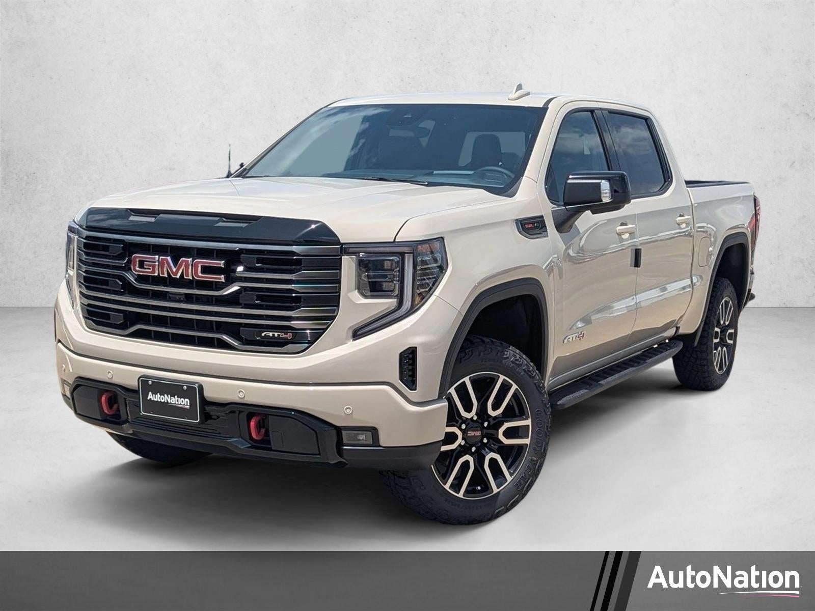 2026 GMC Sierra 1500 AT4 in Coastal Dune — front three-quarter view