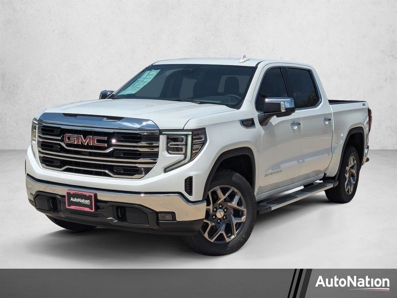 2026 GMC Sierra 1500 SLT in Summit White — front three-quarter view