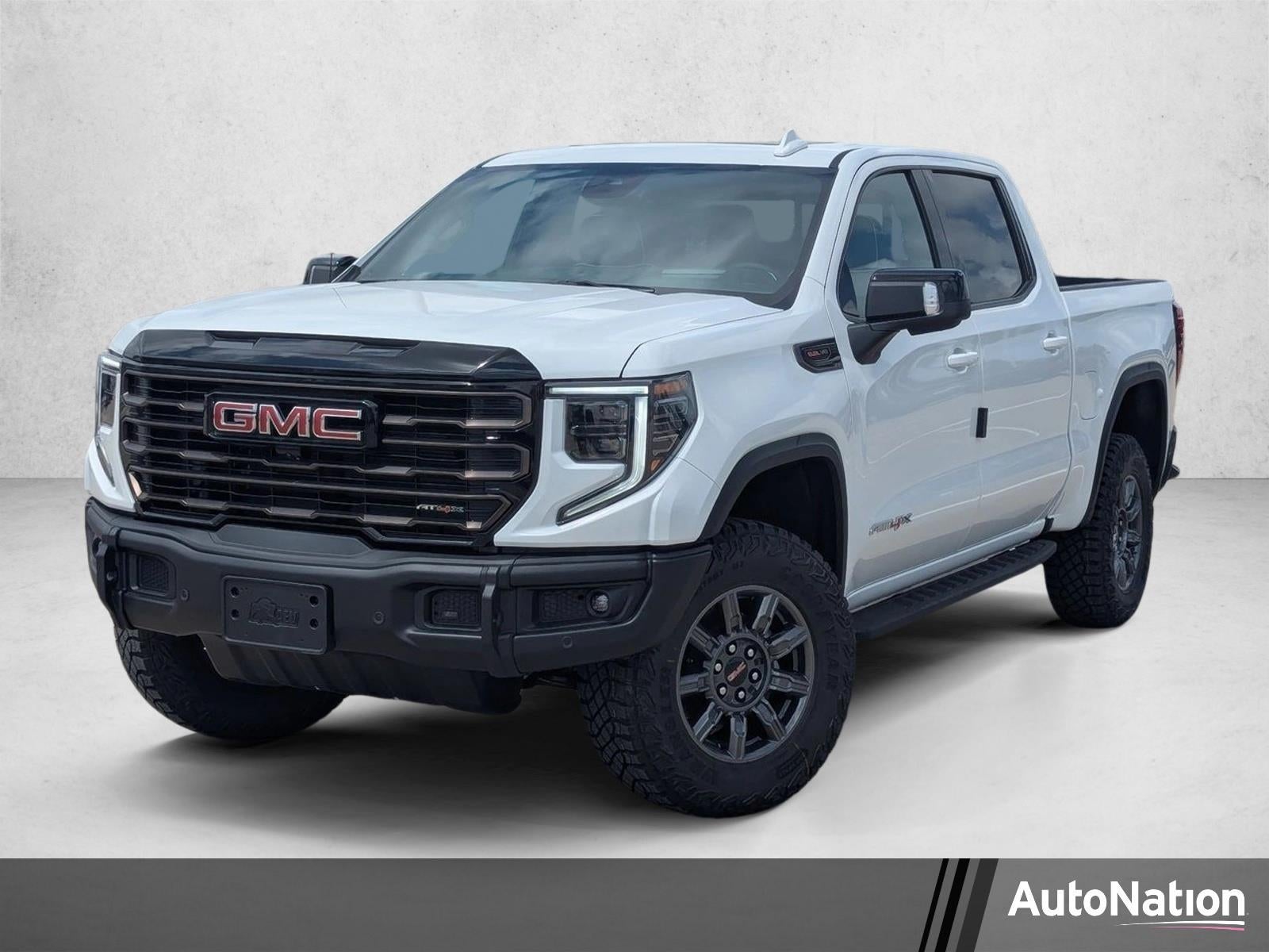 2026 GMC Sierra 1500 AT4X in Summit White — front three-quarter view