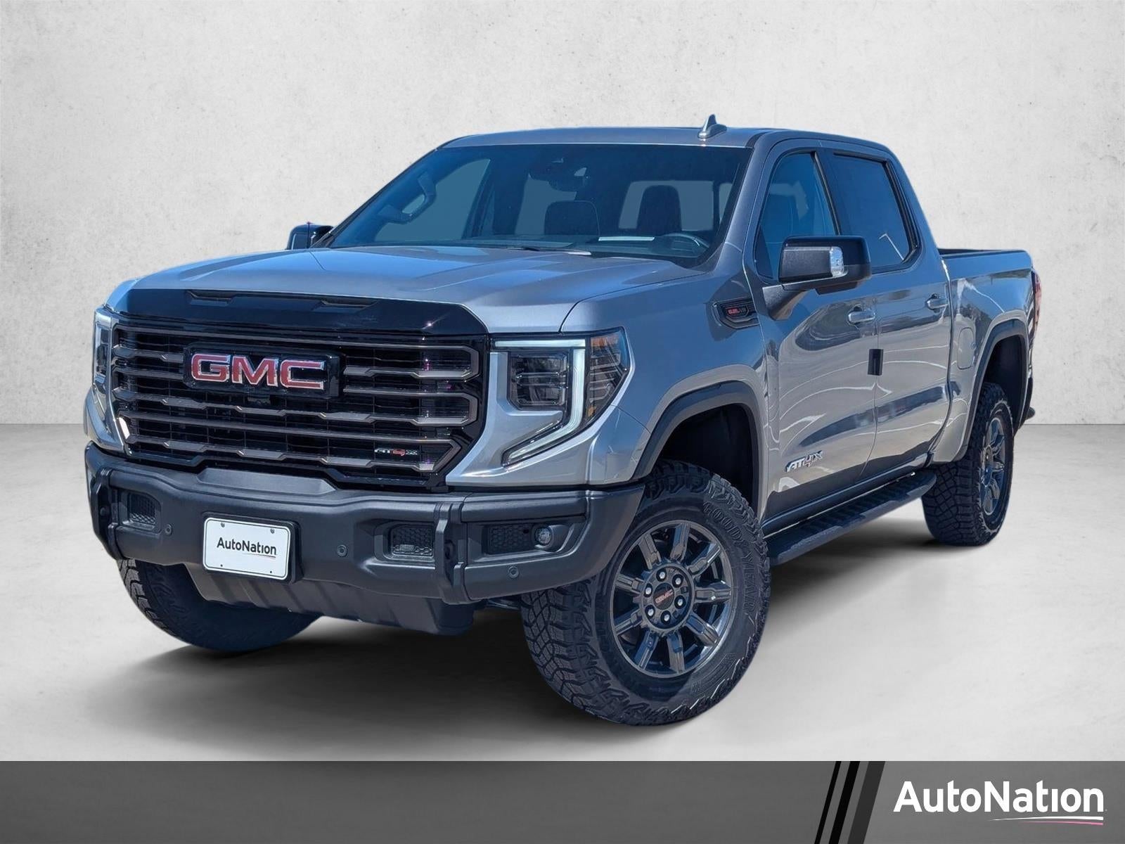 2026 GMC Sierra 1500 AT4X in Sterling Metallic — front three-quarter view