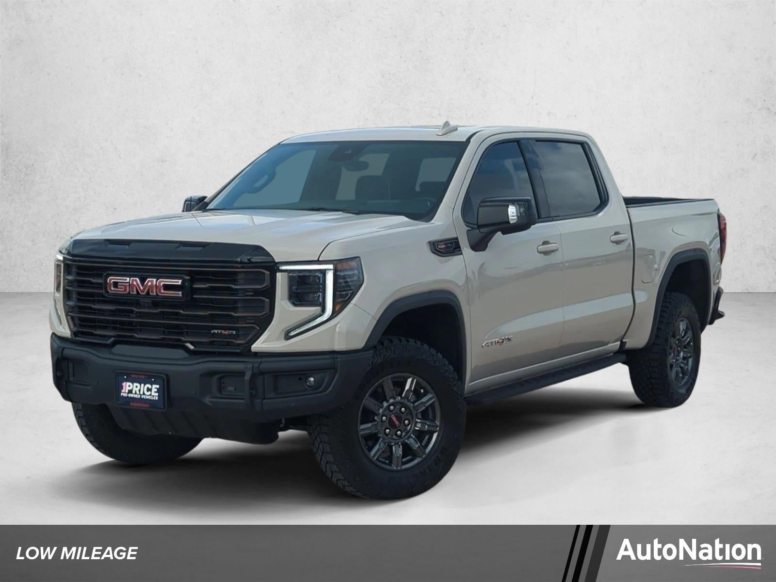 2026 GMC Sierra 1500 AT4X in Coastal Dune — front three-quarter view