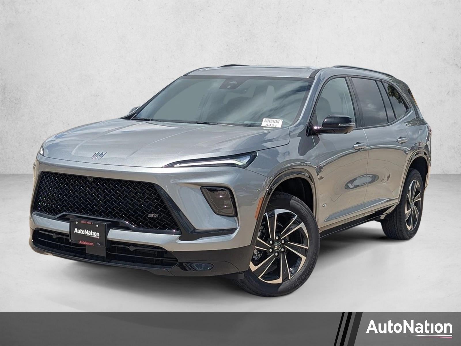 2026 Buick Enclave Sport Touring in Moonstone Gray Metallic — front three-quarter view