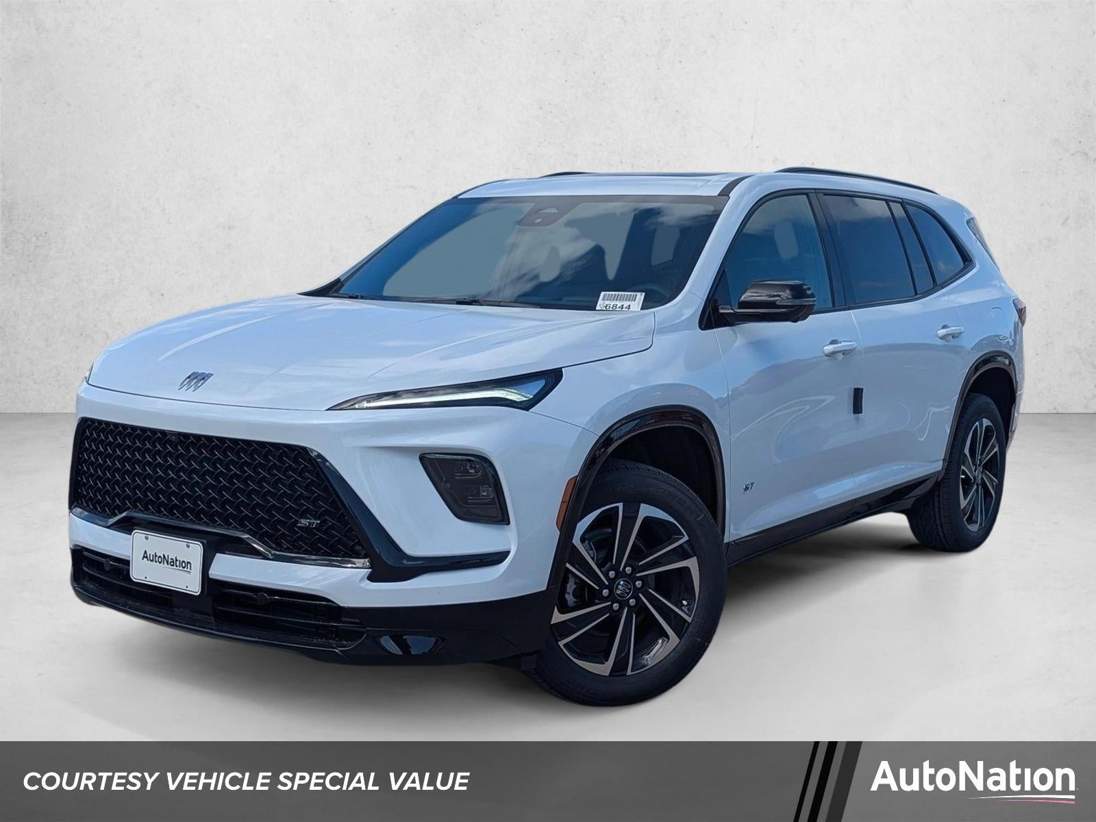 2026 Buick Enclave Sport Touring in Iridescent White Tricoat — front three-quarter view