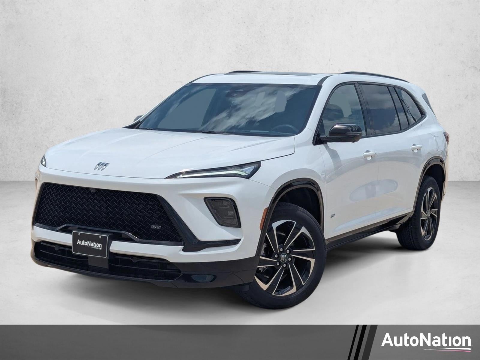 2026 Buick Enclave Sport Touring in Summit White — front three-quarter view