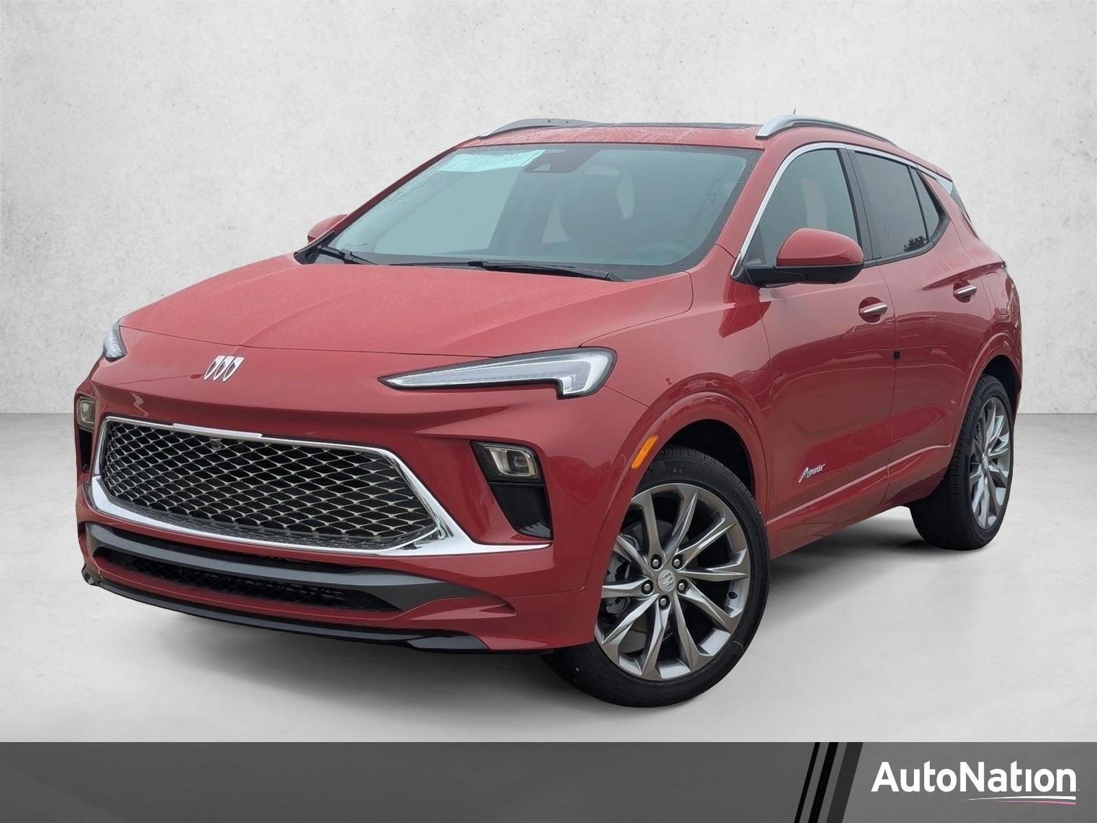 2026 Buick Encore GX Avenir in Brilliant Red — front three-quarter view