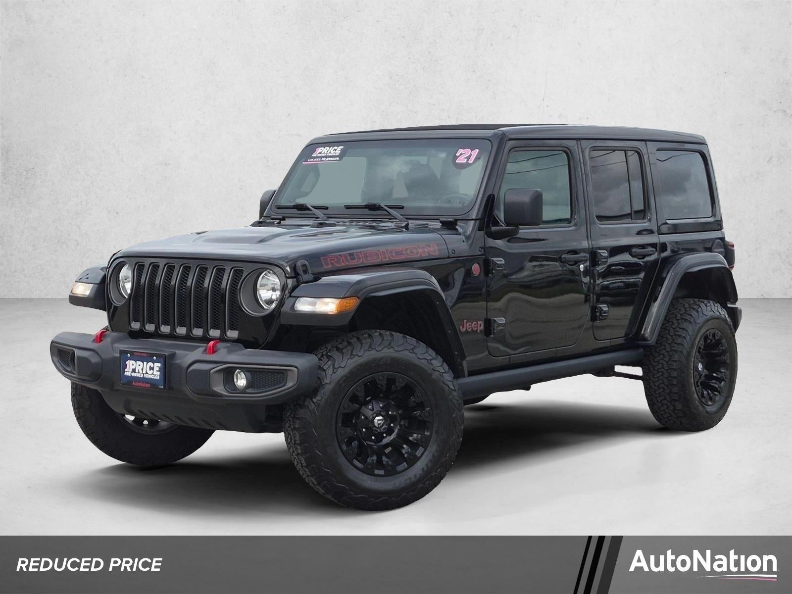2021 Jeep Wrangler Unlimited Rubicon 4x4 in Black Clearcoat — front three-quarter view