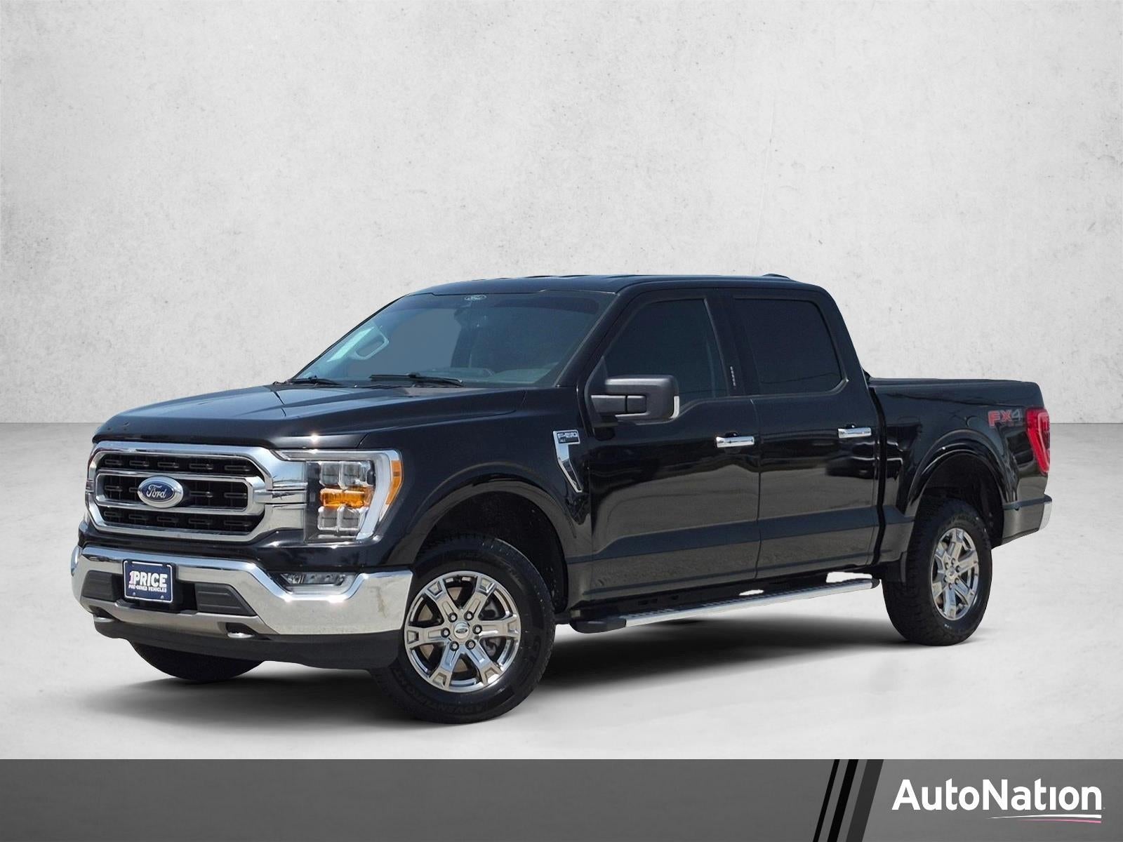 2021 Ford F-150 XLT 4WD SuperCrew 5.5' Box in Agate Black Metallic — front three-quarter view