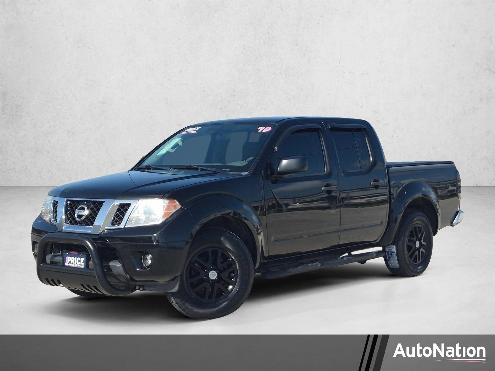 2019 Nissan Frontier Crew Cab 4x2 SV Auto in Magnetic Black Pearl — front three-quarter view
