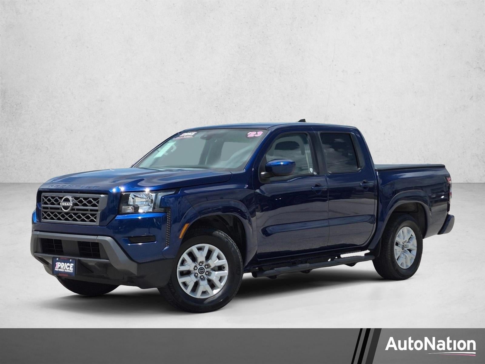 2023 Nissan Frontier Crew Cab 4x2 SV Auto in Deep Blue Pearl — front three-quarter view
