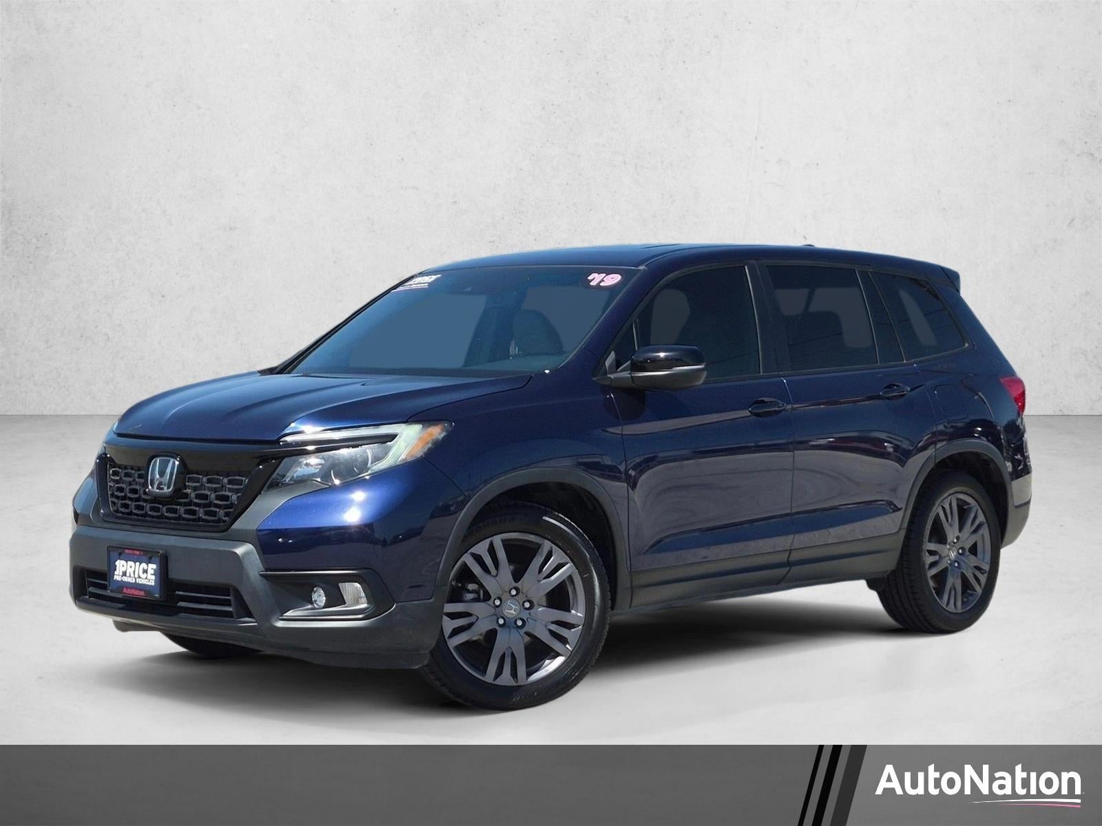2019 Honda Passport EX-L FWD in Obsidian Blue Pearl — front three-quarter view