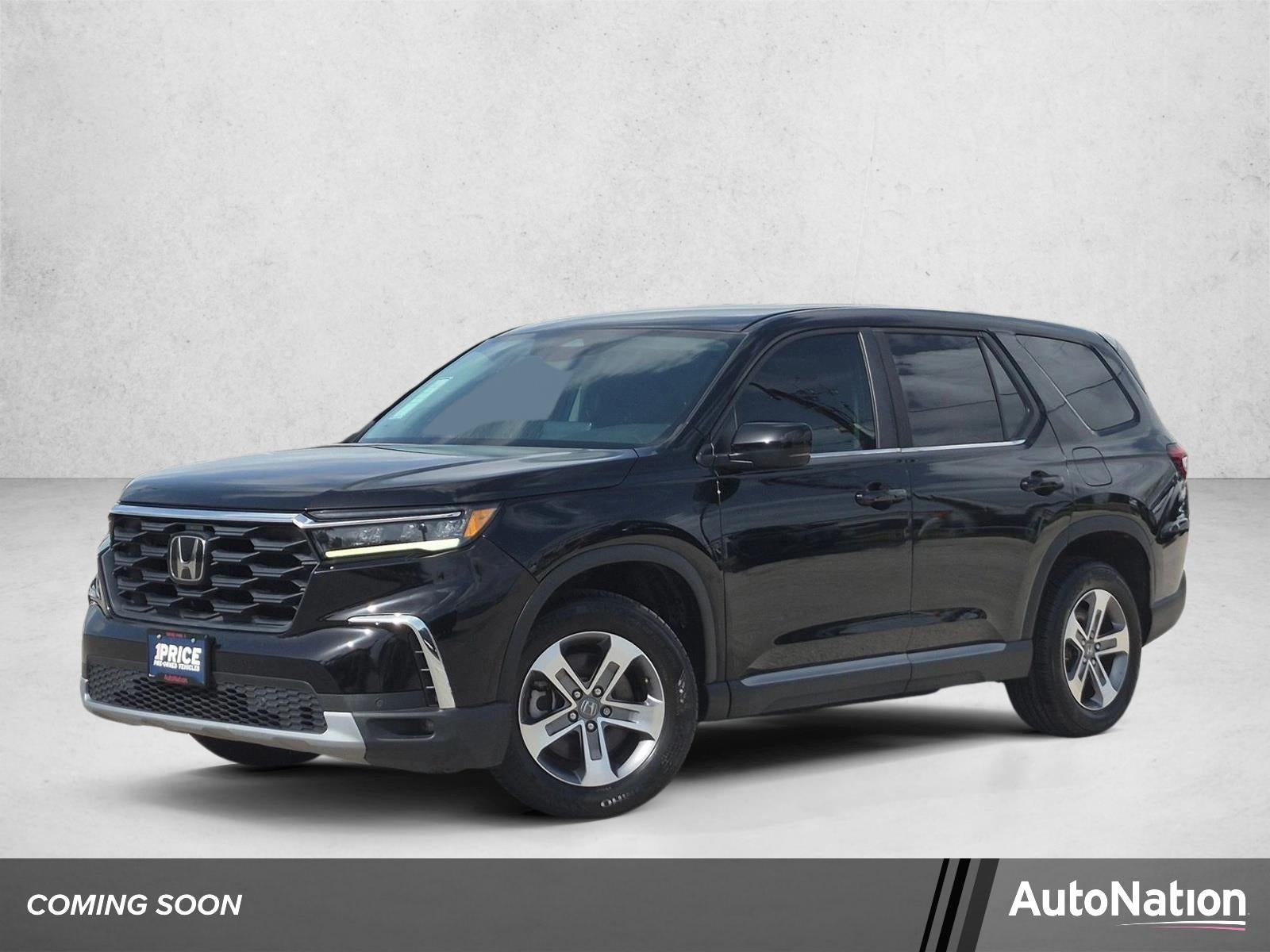 2024 Honda Pilot EX-L 8 Passenger 2WD in Crystal Black Pearl — front three-quarter view