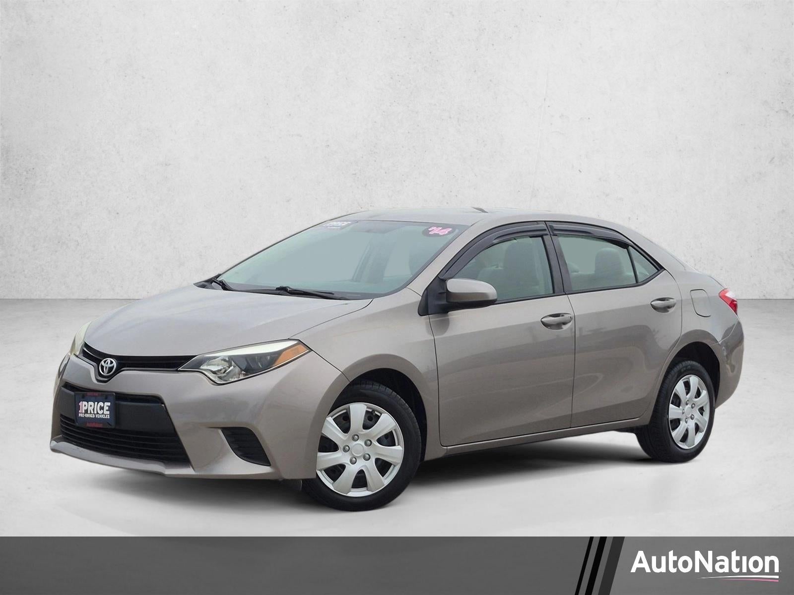 2014 Toyota Corolla 4dr Sdn CVT Auto LE (Natl) in Brown Sugar Metallic — front three-quarter view