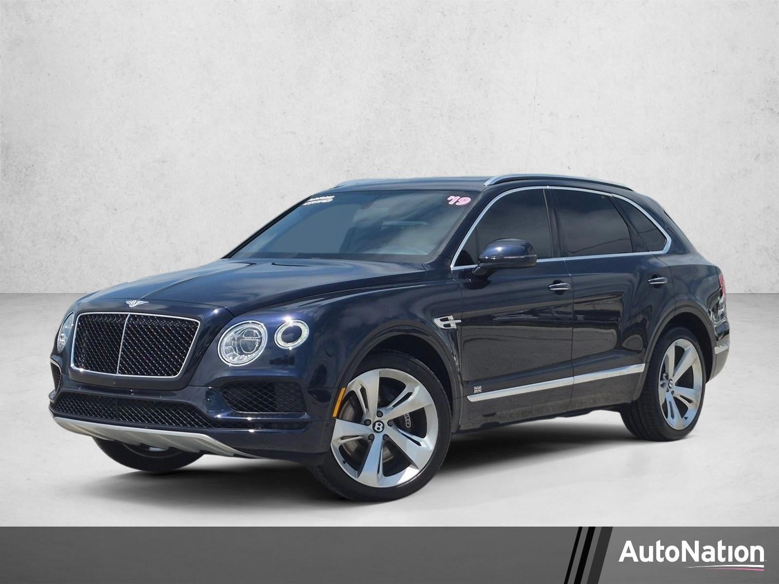 2019 Bentley Bentayga V8 AWD in Light Sapphire By Mulliner — front three-quarter view